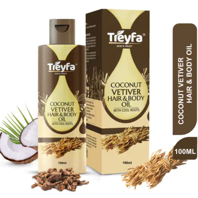 Bottle of Virgin Coconut Vetiver Hair Oil (100ml) with fresh vetiver root bundles.